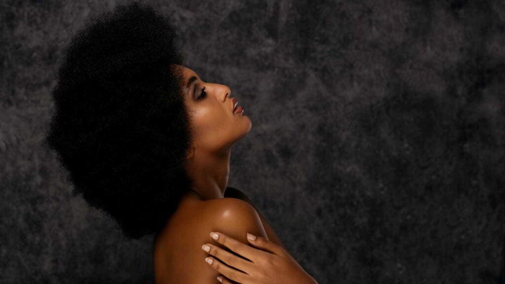 optimized black woman natural hair afro feminine power awakened
