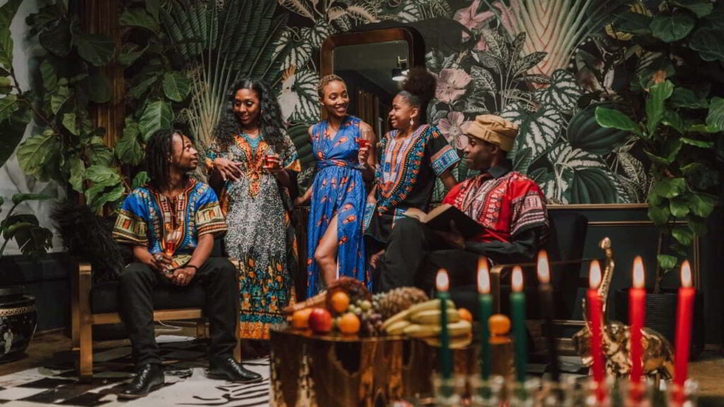 Celebrating Kwanzaa: Embracing Our Roots and Honoring Our Powerful Legacy. 1 optimized black friends celebrating kwanzaa